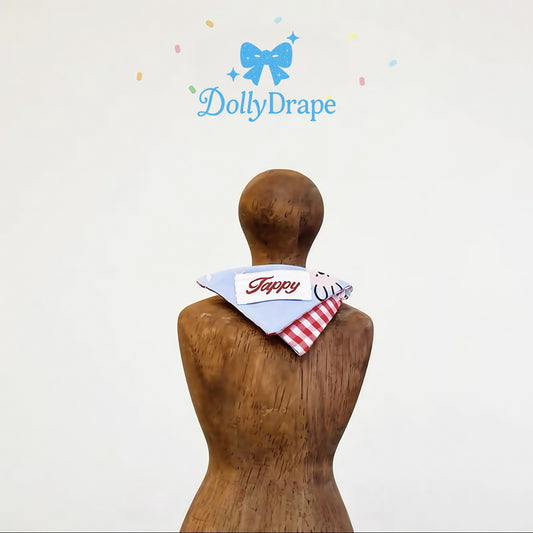 Labubu clothes – back view of plush with gingham doll bib