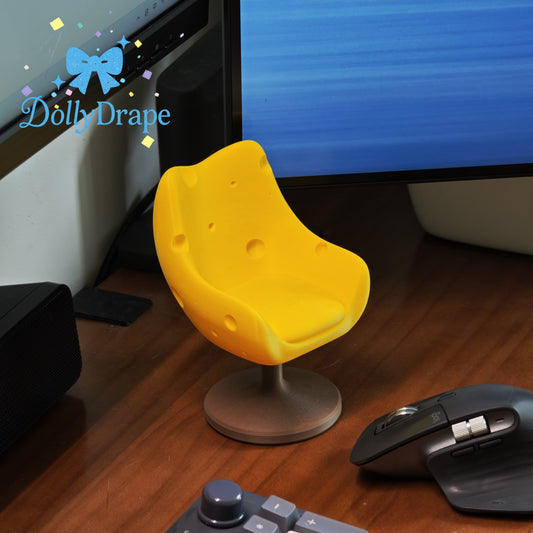 Yellow cheddar swivel chair for Labubu clothes display